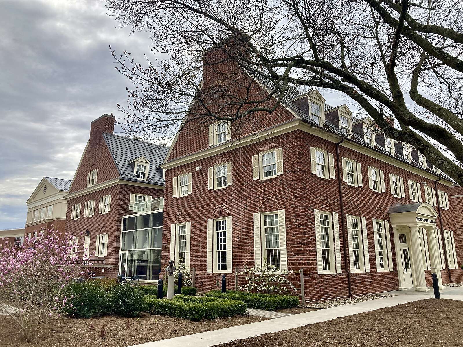 The exterior of the Humanities Center at Bucknell University is featured.