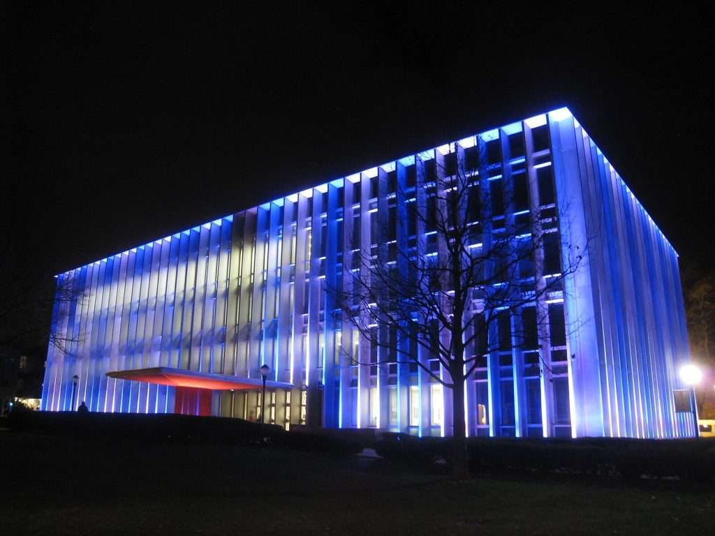 Carnegie Mellon University’s Hunt Library is illuminated at night.