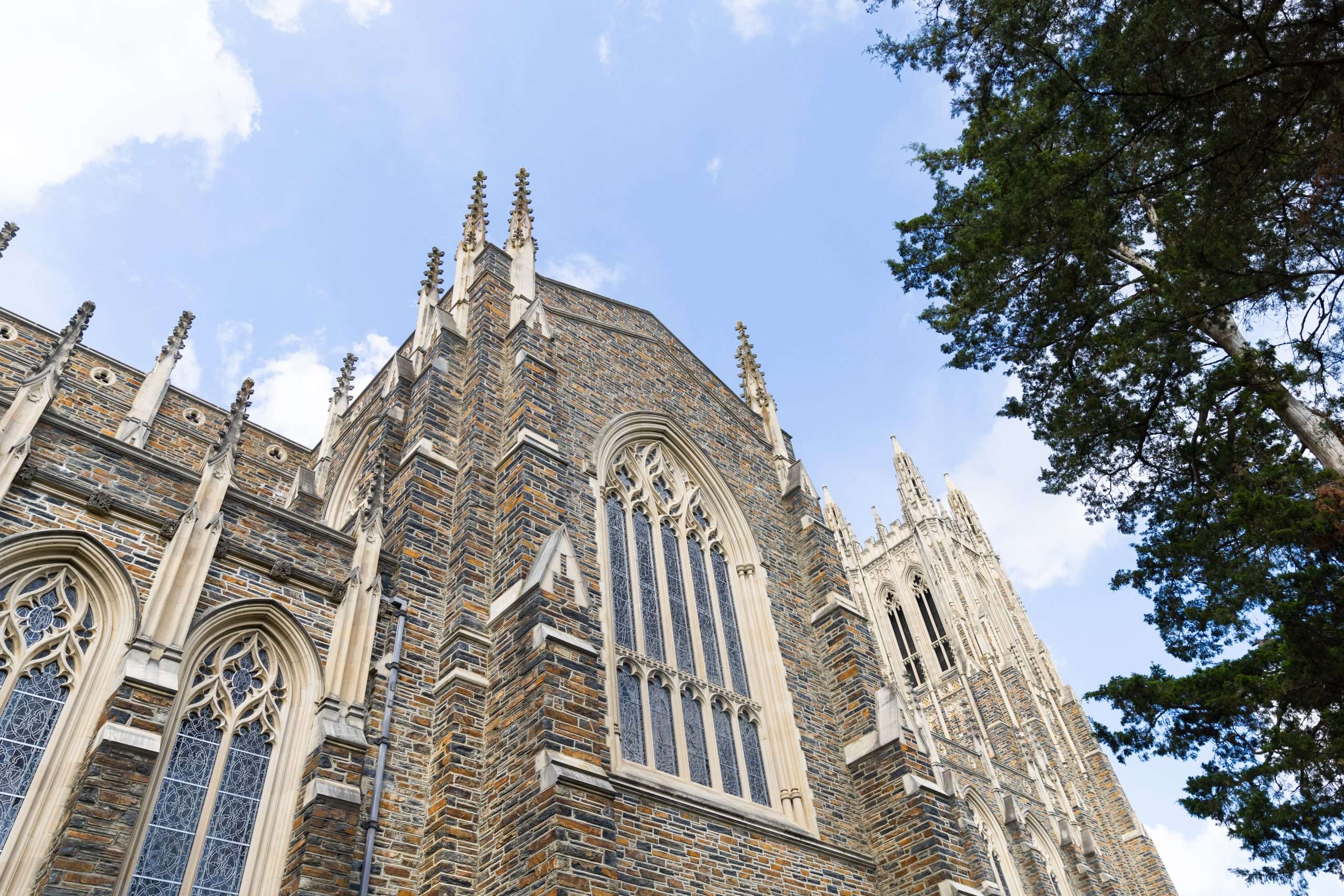An exterior view of Duke Chapel's gothic architecture from below.