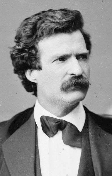 This is a black and white portrait of the author Mark Twain.
