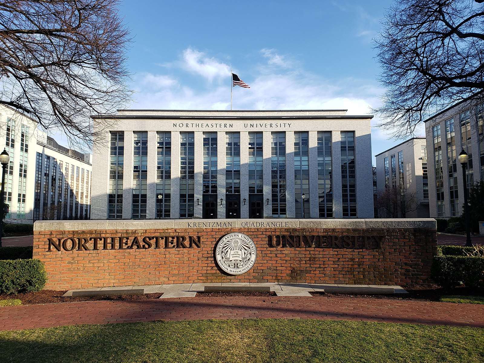 The sign for Northeastern University is featured on its campus.