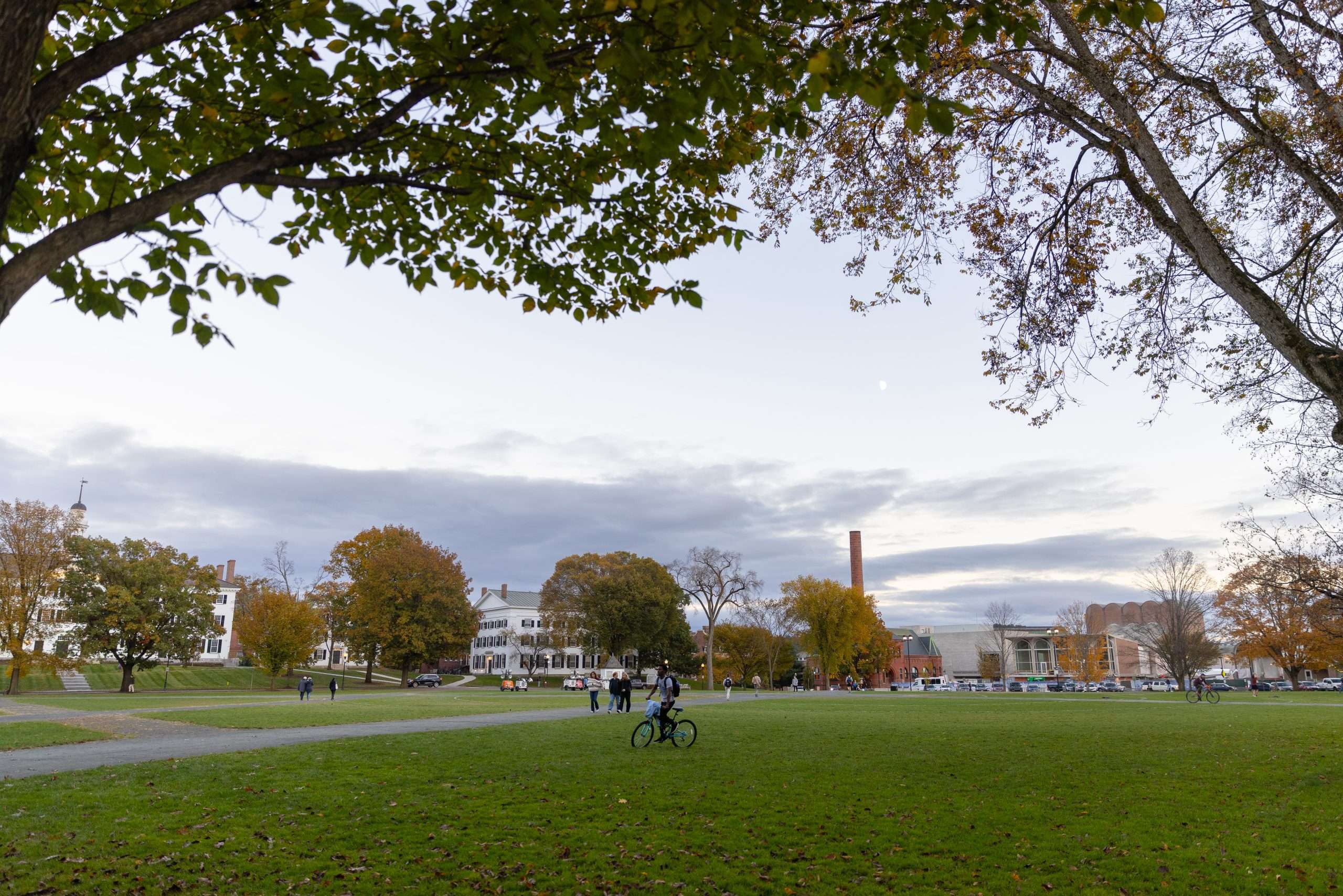 Students cross The Green at Dartmouth College.