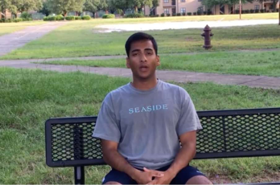 Soutrik Bhattacharya sits on a bench.