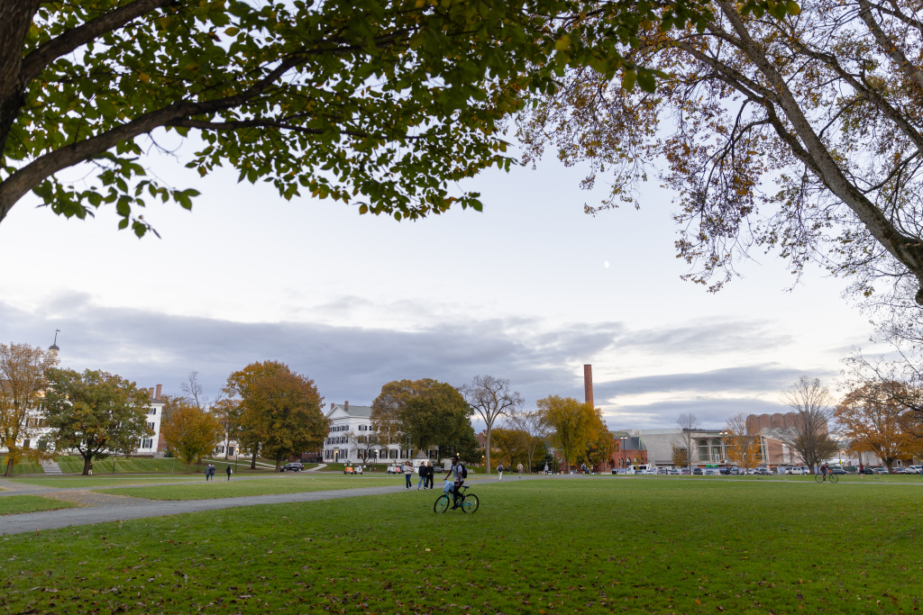 Dartmouth College’s Green is featured under a cloudy sky.